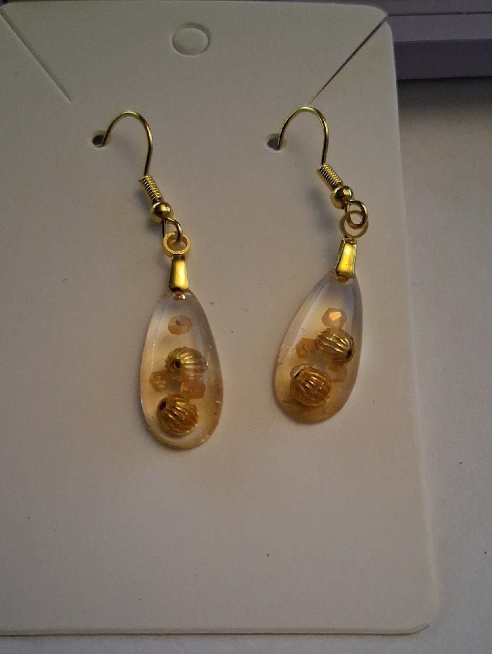 Gold-Tone Teardrop Dangle Earrings - Clear Resin with Gold Beads